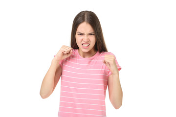 Young angry girl on white background