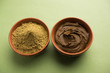 Henna / Mehandi powder and paste. Prepared for Hair colouring or for tattoo on hand in Indian weddings/festivals. selective focus