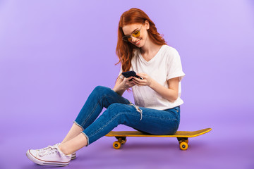 Sticker - Full length portrait of a happy young girl in sunglasses