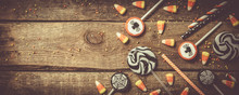 Halloween Background - Candies And Lollipops, Straws, Wood Background