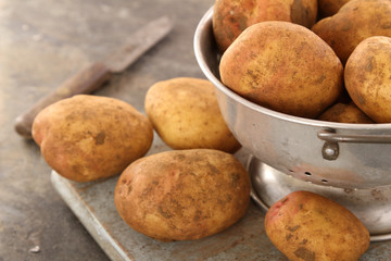 Wall Mural - preparing fresh potatoes