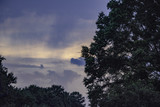 Fototapeta Na ścianę - Sunset clouds trees