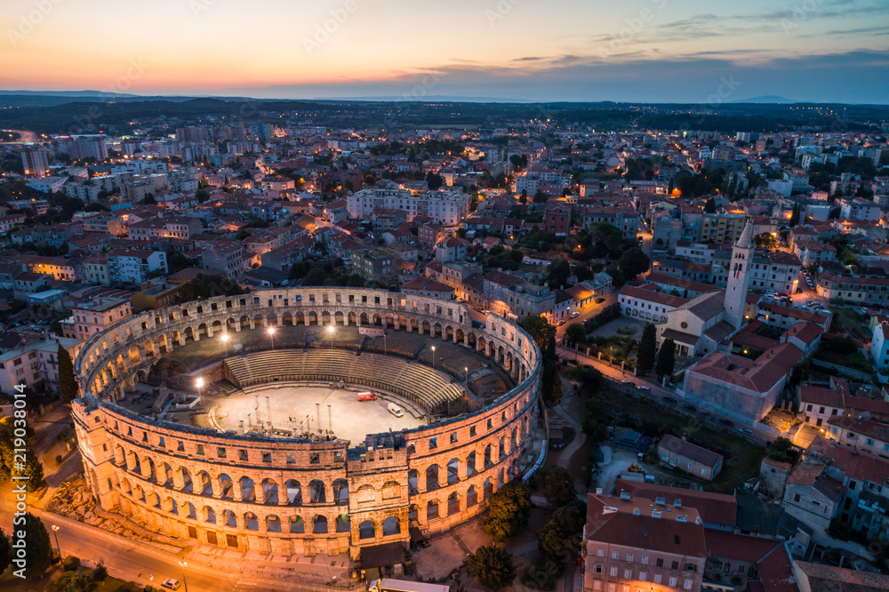 Aerial photo of Roman Colosseum in Pula, Croatia at night - obrazy, fototapety, plakaty 