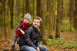© Maria Sbytova - Little boy with his father during stroll in the forest