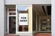 for rent sign in empty shop window