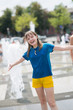 © Evgenia Tiplyashina - girl is playing in a fountain