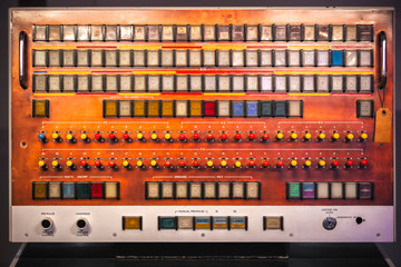 Selective focus, early computer, Ferranti Atlas Computer Console with many pushbuttons and toggle switches