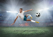 © Andrii IURLOV - Soccer player on a football field in dynamic action at summer day