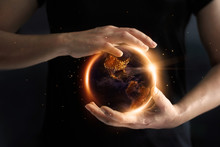 Hands Holding Global Showing The World' S Energy Consumption At Night, Environment And Energy Conservation Concept. Earth Day. Elements Of This Image Furnished By NASA