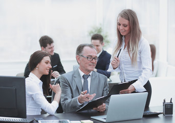 business team discussing with the head of financial data