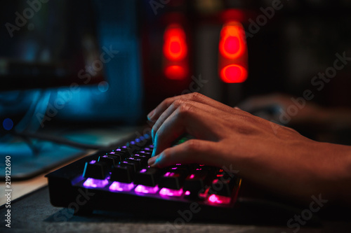 Hands Of Professional Gamer Boy Playing Video Games On