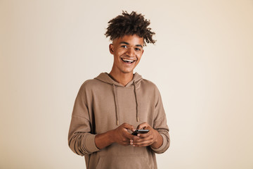 Wall Mural - Portrait of a cheerful young afro american man