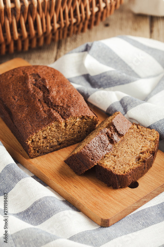 Fotomural Pumpkin loaf cake on rustic wooden board