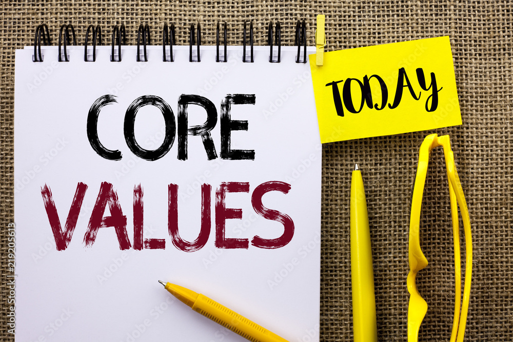 Handwriting text Core Values. Concept meaning Principles Ethics Conceptual Accountability Code Components written Notebook the jute background Today Pens and Glasses next to it.