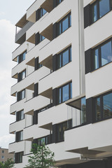 balconies of a building, a building in a residential area.