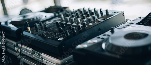Photo  Close up of DJ CD player and mixer