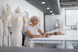 © ReeldealHD images - Muslim female fashion designer working on ideas