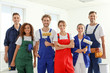 © New Africa - Team of professional painters with tools indoors