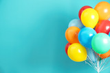 Bunch of bright balloons and space for text against color background