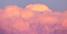 Magnificent Colorful Clouds In The Evening Sky. Bright, Pink Clouds In The Sky At Sunset. Beautiful Evening Skyscape. Abstract, Purple Pink Background. Vibrant Color Photograph.