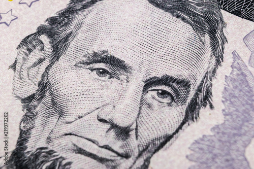 Fotografie, Obraz Close up view Portrait of Abraham Lincoln on the one five dollar bill