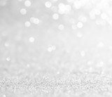 Fototapeta Natura - silver and white bokeh lights defocused. abstract background