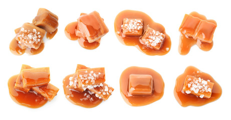 Wall Mural - Set with delicious caramel candies and sauce on white background, top view
