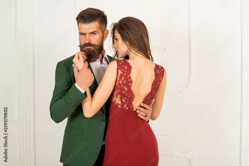 Woman dominates the man, sexy games, obeys man. Pretty young woman and