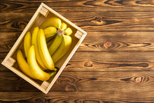 Large Rectangular Wooden Box Holding Bananas