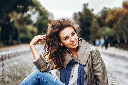 Cute Girl With Curly Hair Relaxing Outdoor Buy This Stock Photo