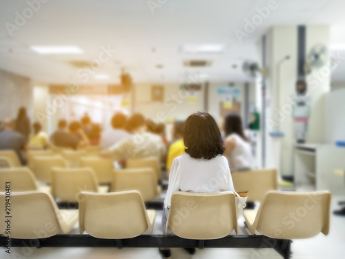 Young Woman And Many People Waiting Medical And Health