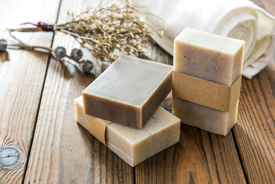 Fototapete - Handmade natural soap on wooden background