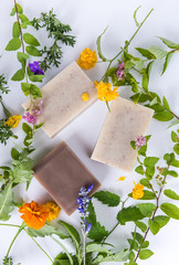 Poster - Top view of beautiful natural handmade soap with herbs.
