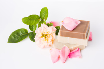 Poster - Handmade soap with flower petals on white background