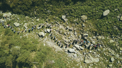 Wall Mural - top view hiker people traveling on background mountain river. hiking mountain