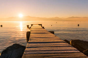 Wall Mural - Sunrise over Frozen Wood Pier, Leman Lake and Iconic Snowy Mont-Blanc.