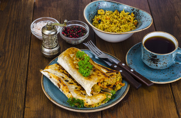 Wall Mural - Fast street food. Lavash, shavarma with rice, chicken and vegetables