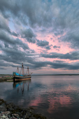 Fototapete - Ship Hector replica at sunset in Pictou, Nova Scotia