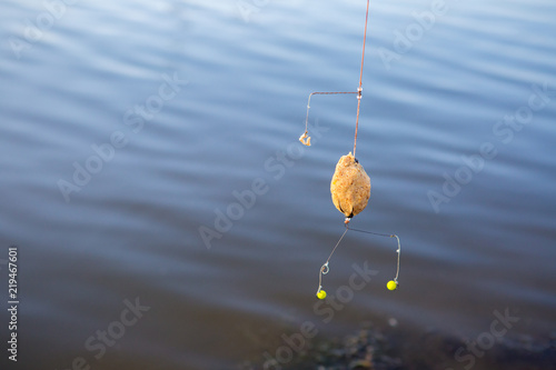 Feeding Trough For Fish Against Background Of Lake Feeder Fishing