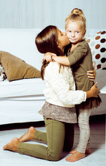 little cute boy and girl hugging playing on white background, ha