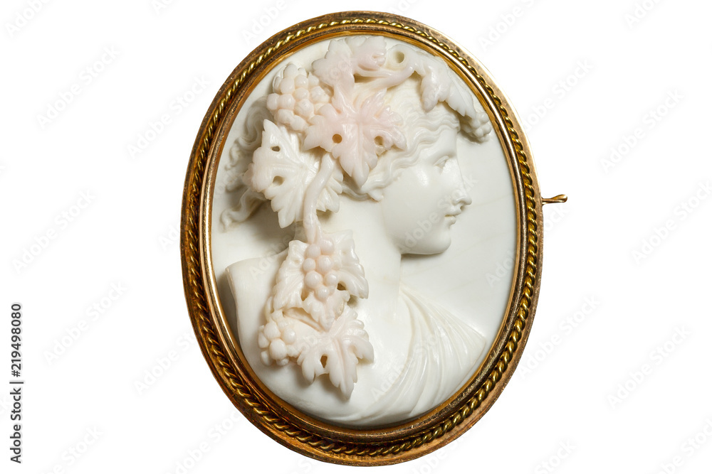 Gold vintage brooch with a woman's face in profile - obrazy, fototapety, plakaty 