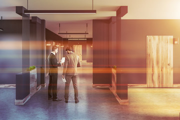 Wall Mural - Gray hotel lobby, closed wooden doors, businessmen