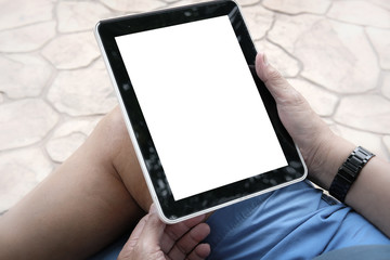 man holding tablet. hand texting message, using app with touchpad outdoor