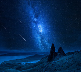 Wall Mural - falling stars over old man of storr at night, scotland
