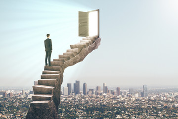 Wall Mural - Man on stairs with door