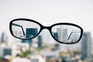 Wall Mural - Close up of optical glasses in city