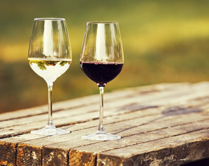 Two glasses of wine, red wine and white wine outdoor