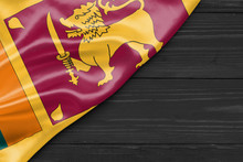 Sri Lanka Flag And Place For Text On A Dark Wooden Background