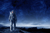 Fototapeta Kosmos - Astronaut and his mission. Mixed media