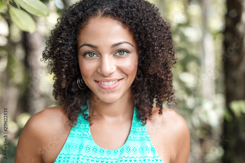 Beautiful African American Woman With Long Curly Hair Green Eyes